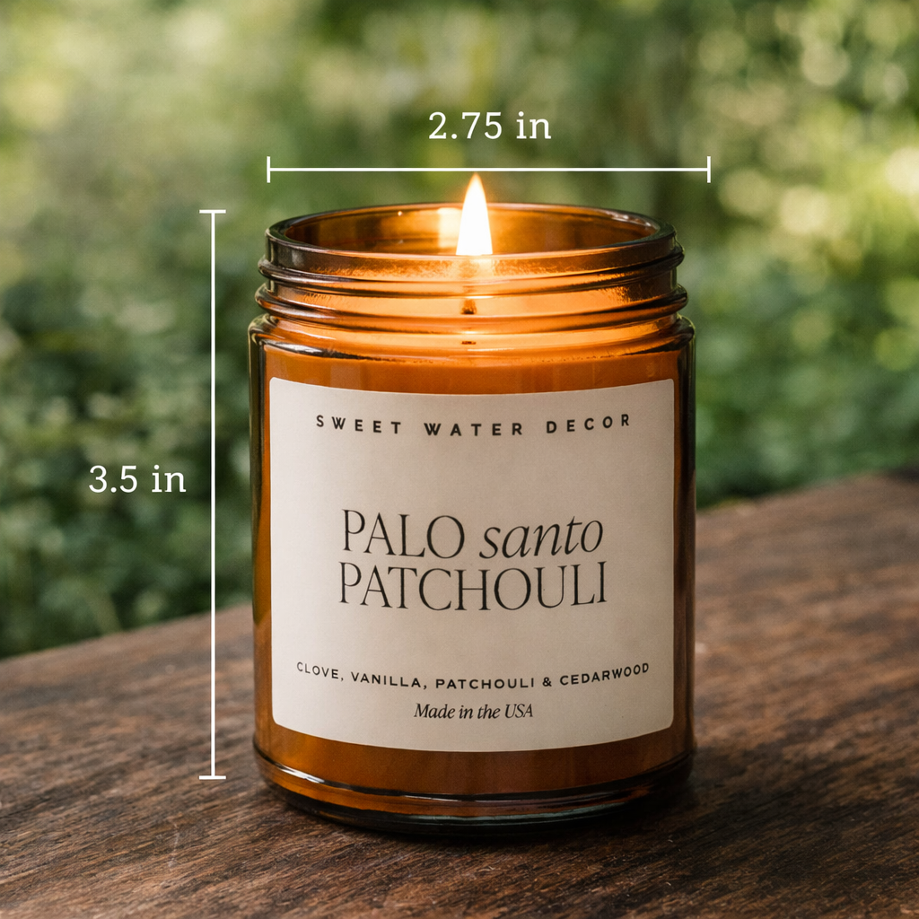 Sweet Water Decor Palo Santo Patchouli candle with labeled dimensions of 3.5 inches tall by 2.75 inches wide, shown lit against a soft natural background